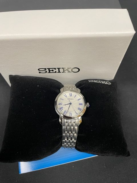 Seiko SUR629 Women's Blue Roman Numeral White Dial Stainless Watch
